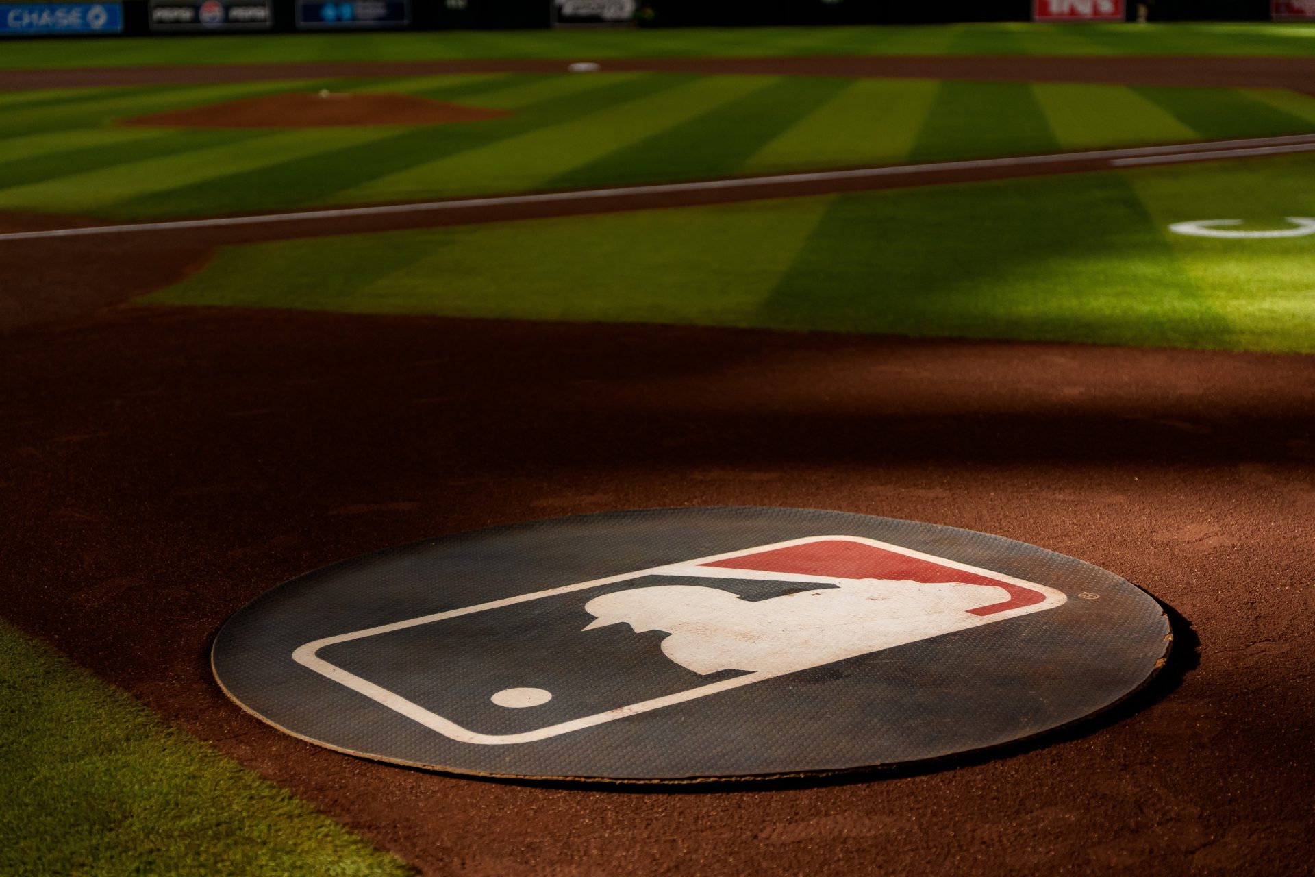 Aug 23, 2025; Phoenix, Arizona, USA; A general view of the MLB logo before the start of a game between the Cincinnati Reds and Arizona Diamondbacks at Chase Field.