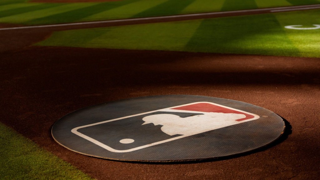 Aug 23, 2025; Phoenix, Arizona, USA; A general view of the MLB logo before the start of a game between the Cincinnati Reds and Arizona Diamondbacks at Chase Field.