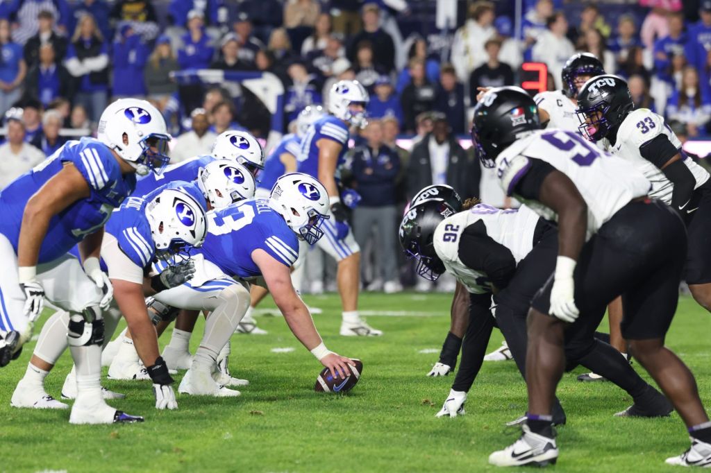 Nov 15, 2025; Provo, Utah, USA; The BYU Cougars offense lines up against the Texas Christian University Horned Frogs defense during the first half at LaVell Edwards Stadium.