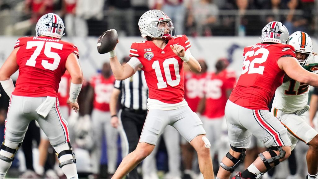 Ohio State Buckeyes quarterback Julian Sayin (10) throws during the Cotton Bowl at AT&T Stadium in Arlington, Texas for the College Football Playoff quarterfinal game against the Miami Hurricanes on Dec. 31, 2025.