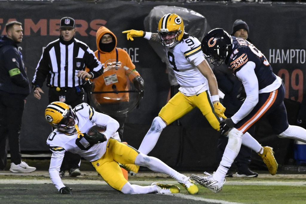 Jan 10, 2026; Chicago, IL, USA; Green Bay Packers wide receiver Matthew Golden (0) scores a touchdown against the Chicago Bears during the second half of an NFC Wild Card Round game at Soldier Field.