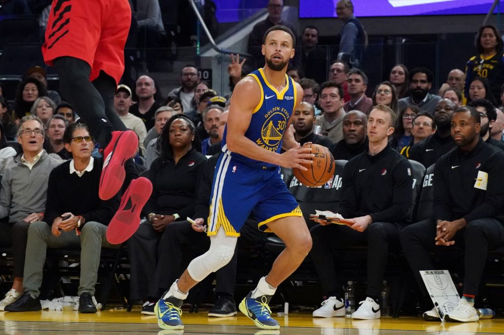 Jan 13, 2026; San Francisco, California, USA; Golden State Warriors guard Stephen Curry (30) looks to shoot a jump shot against the Portland Trail Blazers in the third quarter at Chase Center.