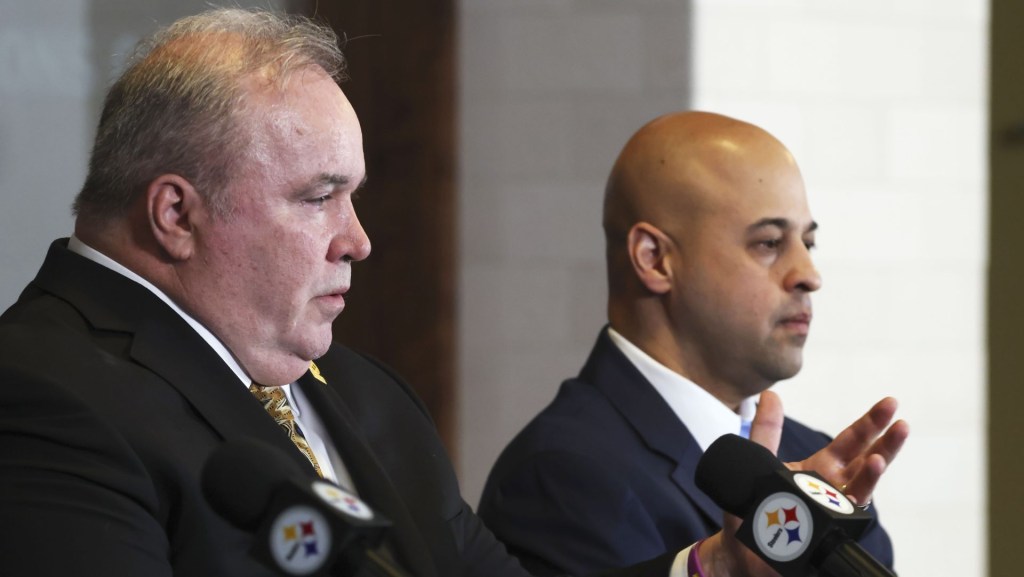 Jan 27, 2026; Pittsburgh, PA, USA; Pittsburgh Steelers head coach Mike McCarthy (left) speaks at a press conference introducing him as the next head coach of the Steelers as general manager Omar Khan (right) listens in at PNC Champions Club at Acrisure Stadium.