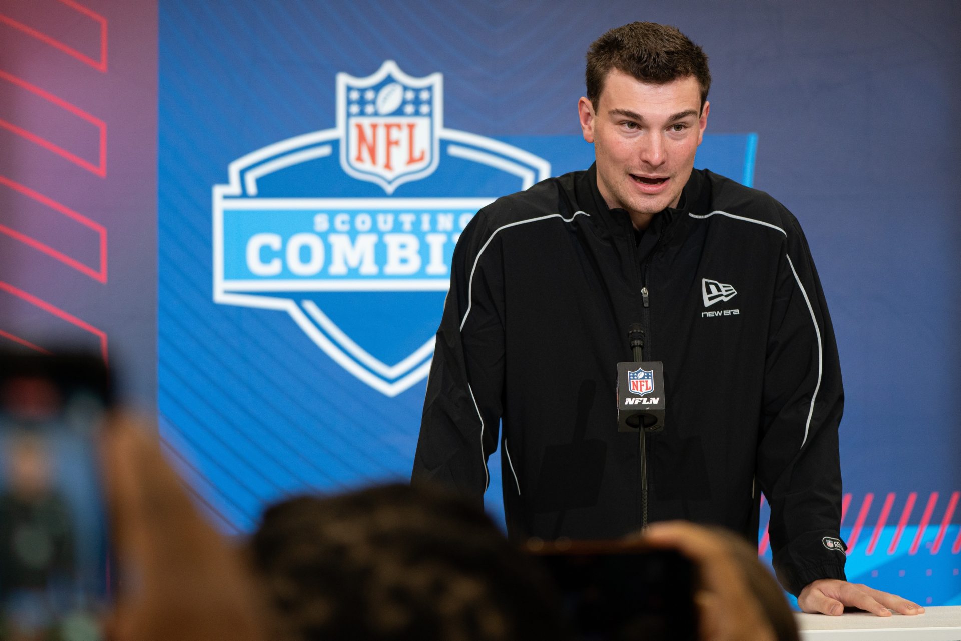 Feb 27, 2026; Indianapolis, IN, USA; Indiana quarterback Fernando Mendoza (QB11) speaks to members of the media during the NFL Combine at the Indiana Convention Center.
