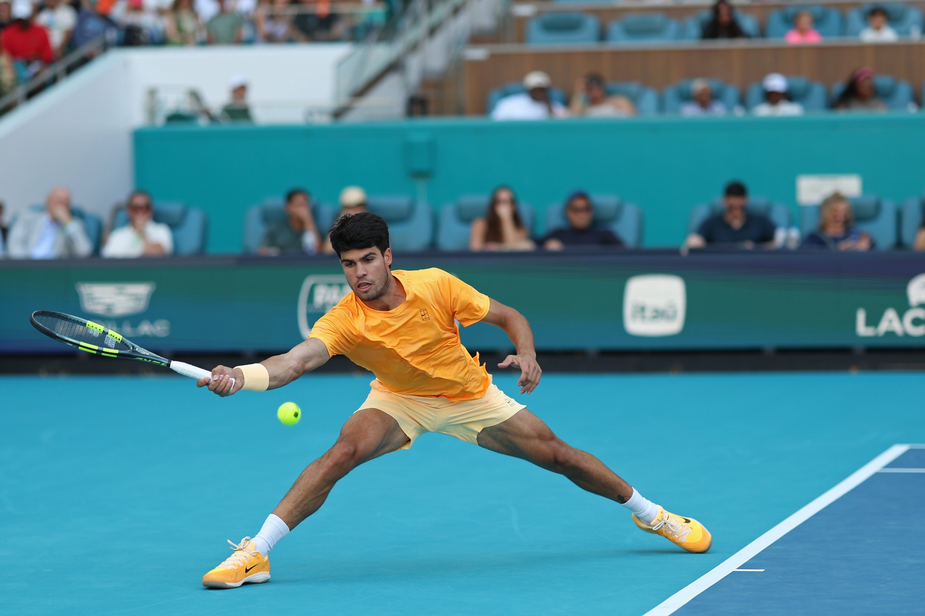 Mar 22, 2026; Miami Gardens, FL, USA; Carlos Alcaraz (ESP) reaches for a forehand against Sebastian Korda (USA) (not pictured) on day six of the 2026 Miami Open at Hard Rock Stadium.