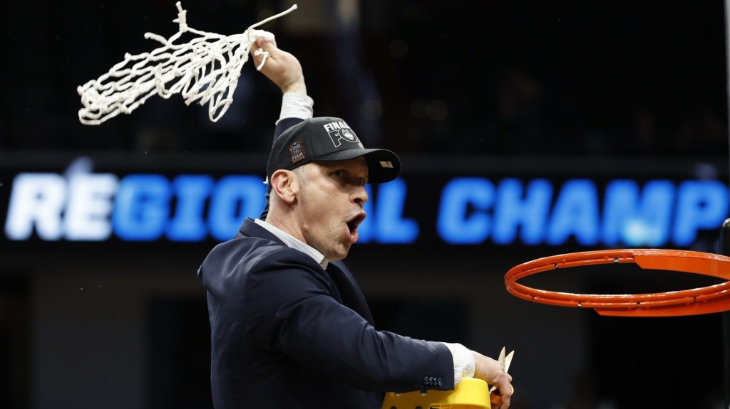 Mar 29, 2026; Washington, DC, USA; UConn Huskies head coach Dan Hurley cuts down the net after defeating the Duke Blue Devils in an Elite Eight game of the East Regional of the men's 2026 NCAA Tournament at Capital One Arena