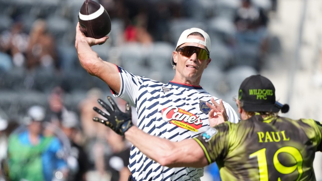 Mar 21, 2026; Los Angeles, CA, USA; Founders FFC quarterback Tom Brady (12) throws ball against Logan Paul of Wildcats FFC during the Fanatics Flag Football Classic at BMO stadium. Mandatory Credit: Kirby Lee-Imagn Images