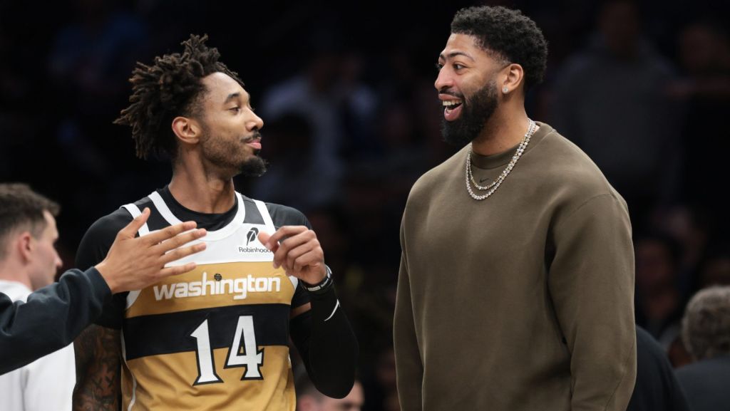 Apr 5, 2026; Brooklyn, New York, USA; Washington Wizards forward Anthony Davis (23) talks with forward Leaky Black (14) during the first half against the Brooklyn Nets at Barclays Center. Mandatory Credit: Vincent Carchietta-Imagn Images