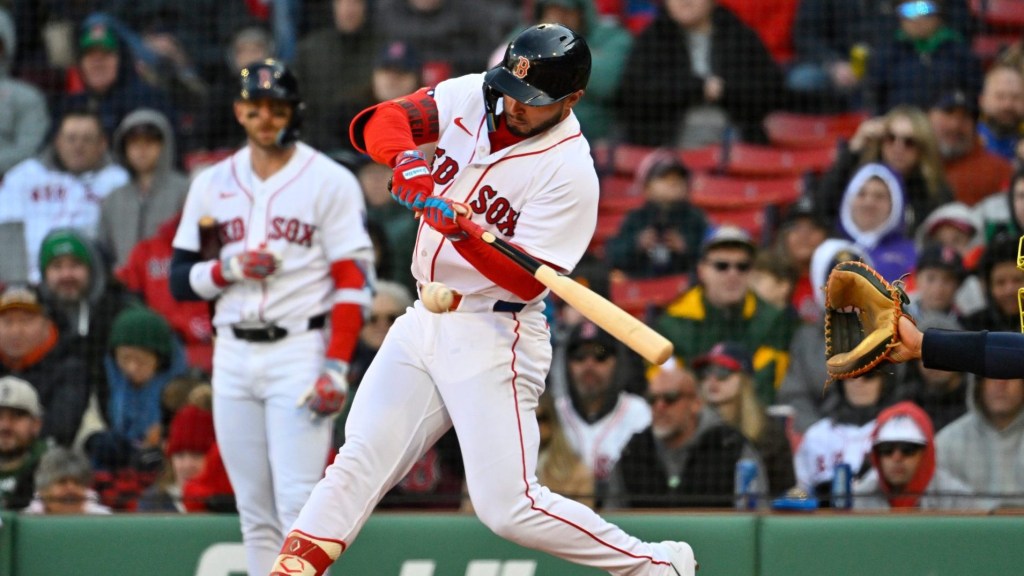 Apr 8, 2026; Boston, Massachusetts, USA; Boston Red Sox right fielder Wilyer Abreu (52) hits a single against the Milwaukee Brewers during the seventh inning at Fenway Park.
