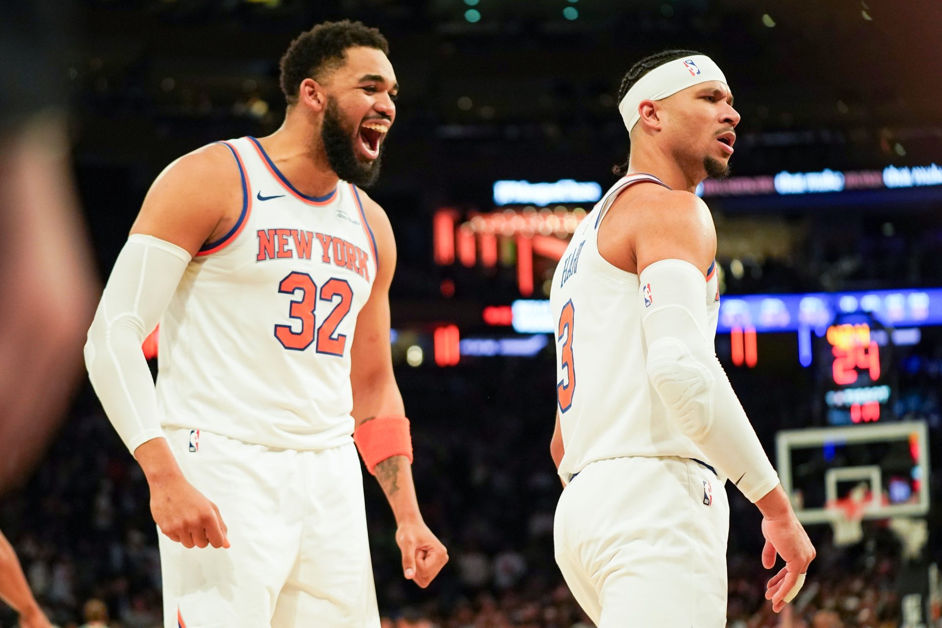 Apr 9, 2026; New York, New York, USA; New York Knicks center Karl-Anthony Towns (32) celebrates with New York Knicks guard Josh Hart (3) after Hart hit a three pointer late in the fourth quarter against the Boston Celtics at Madison Square Garden.