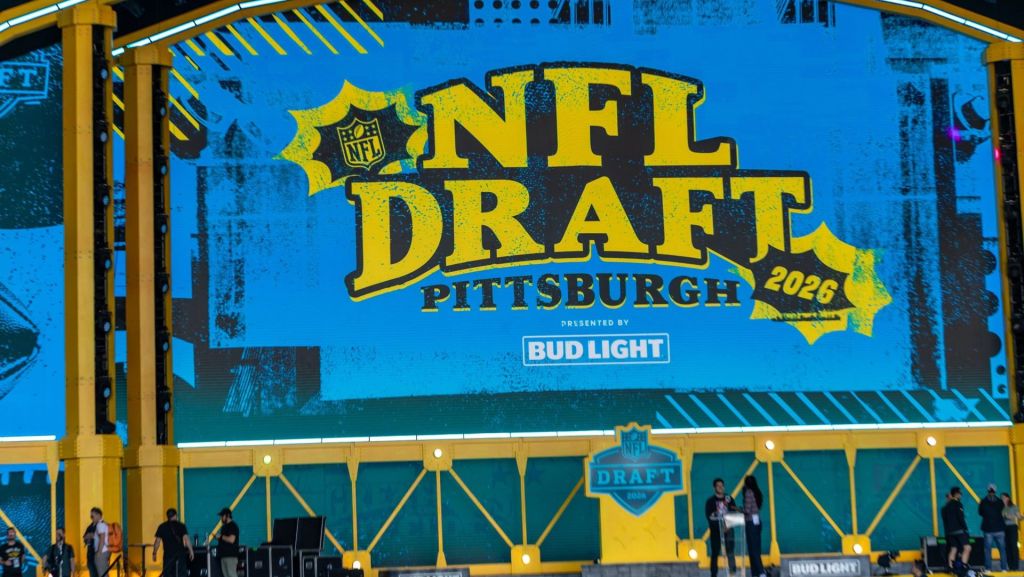 The logo of the 2026 NFL Draft is showcased at the big screen inside the theater Wednesday, April 22, 2026 from outside Acrisure Stadium in Pittsburgh, Pa.