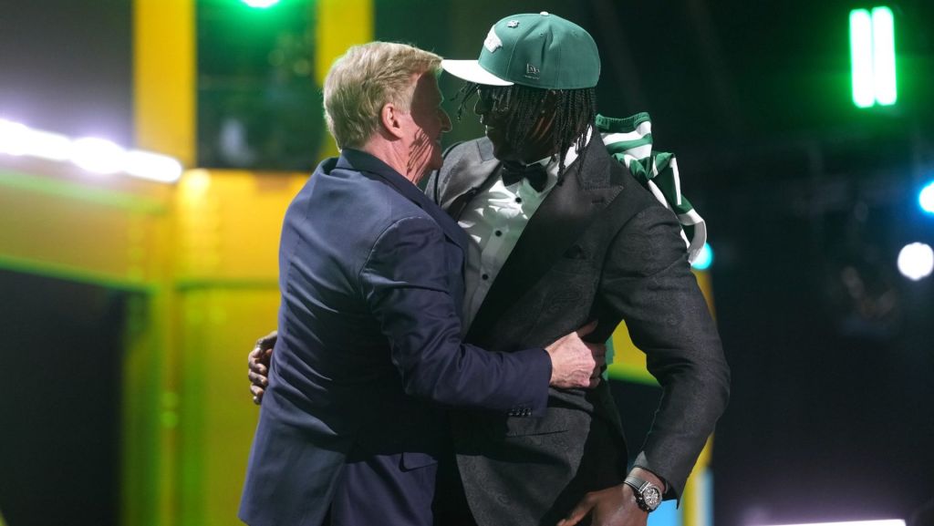Apr 23, 2026; Pittsburgh, PA, USA; Texas Tech Red Raiders linebacker David Bailey embraces NFL commissioner Roger Goodell after he is selected by the New York Jets as the number two pick during the 2026 NFL Draft at Acrisure Stadium.