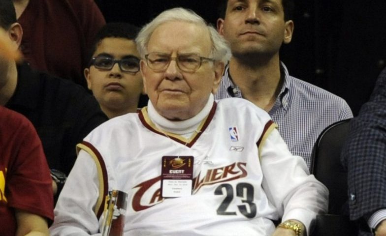 Dec 15, 2014; Cleveland, OH, USA; Warren Buffett and Cleveland Cavaliers owner Dan Gilbert watch the game between the Cleveland Cavaliers and the Charlotte Hornets during the fourth quarter at Quicken Loans Arena. The Cavs beat the Hornets 97-88.