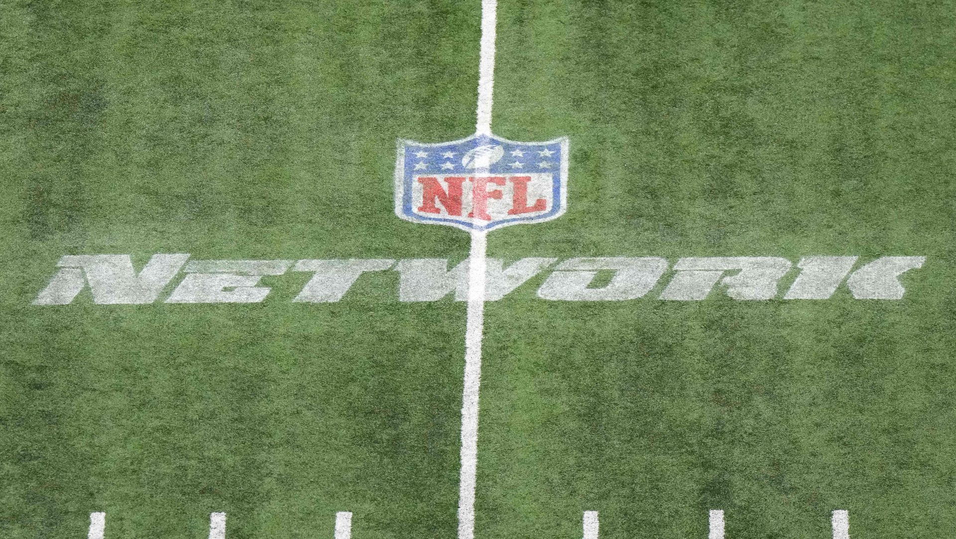 Mar 4, 2023; Indianapolis, IN, USA; The NFL Network logo on the field at Lucas Oil Stadium. Mandatory Credit: Kirby Lee-USA TODAY Sports