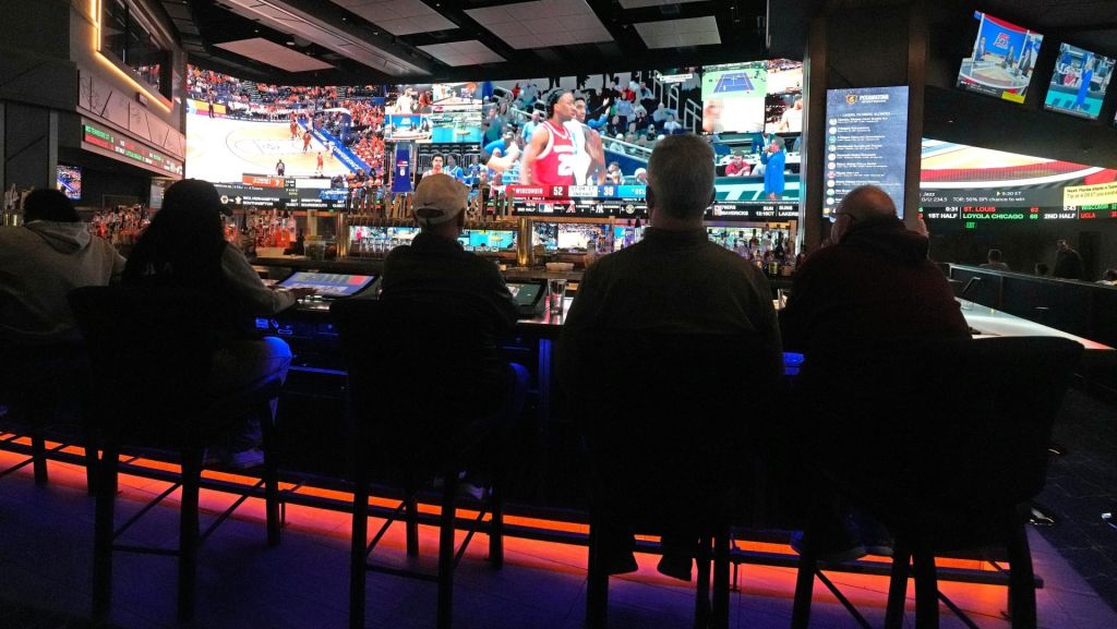 Potawatomi Sports Book patrons watch from the bar the University of Wisconsin men play UCLA on Friday, March 14, 2025. The venue is open for the first time during March Madness and is expecting to be busy over the next few weeks in Milwaukee.