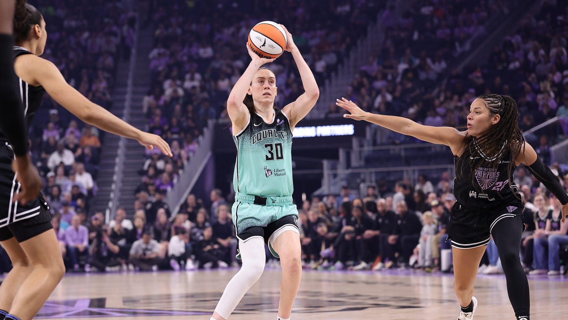 Sep 2, 2025; San Francisco, California, USA; New York Liberty forward Breanna Stewart (30) shoots the ball against Golden State Valkyries guard Veronica Burton (22) during the first quarter at Chase Center.
