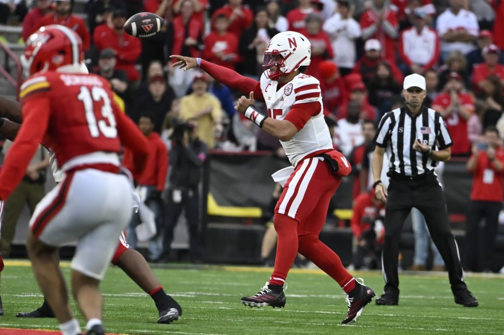 Oct 11, 2025; College Park, Maryland, USA; Nebraska Cornhuskers quarterback Dylan Raiola (15) throws during the second half against the Maryland Terrapins at SECU Stadium.