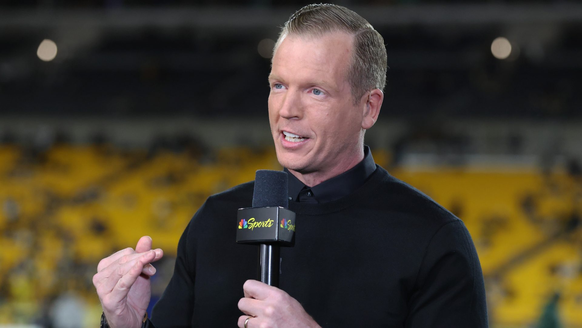 Oct 26, 2025; Pittsburgh, Pennsylvania, USA; Sunday Football Night in America host Chris Simms delivers the pre-game show before the Pittsburgh Steelers host the Green Bay Packers at Acrisure Stadium. Mandatory Credit: Charles LeClaire-Imagn Images