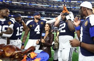 Nov 27, 2025; Arlington, Texas, USA; Dallas Cowboys quarterback Dak Prescott (4) and Dallas Cowboys guard Tyler Booker (52) celebrate with a turkey after the game against the Kansas City Chiefs at AT&T Stadium.