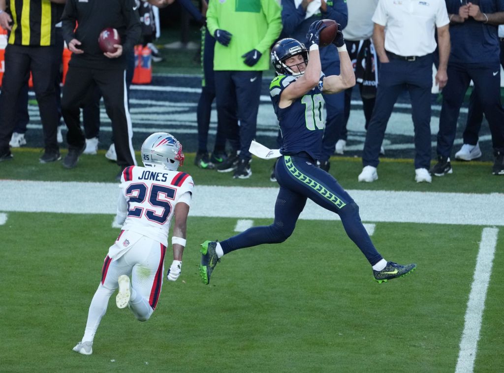 Feb 8, 2026; Santa Clara, CA, USA; Seattle Seahawks wide receiver Cooper Kupp (10) catches a pass against New England Patriots cornerback Marcus Jones (25) in the first half in Super Bowl LX at Levi's Stadium.