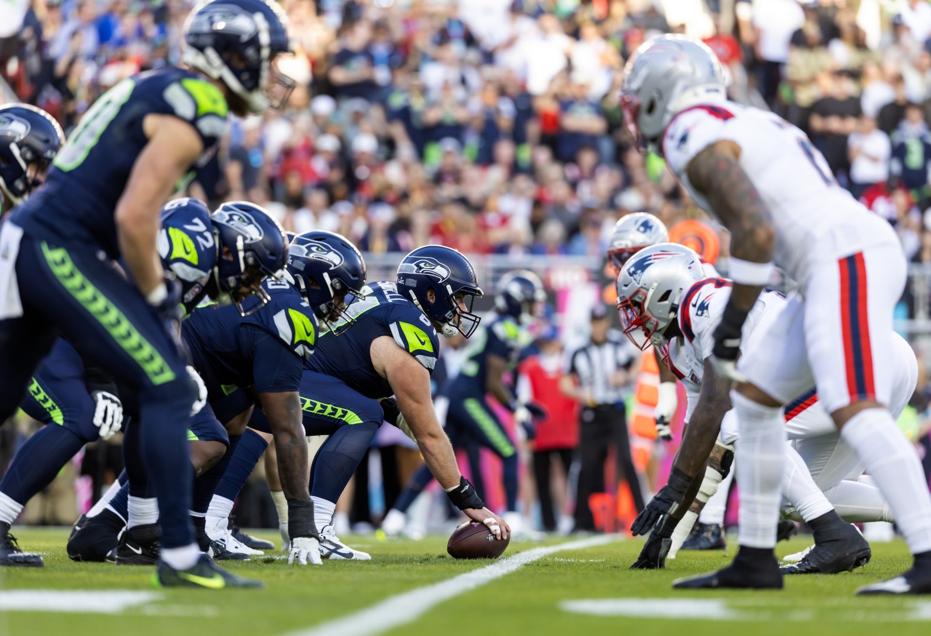 Feb 8, 2026; Santa Clara, CA, USA; General view down the line of scrimmage as Seattle Seahawks center Jalen Sundell (61) prepares to snap the ball against the New England Patriots during Super Bowl LX at Levi's Stadium.