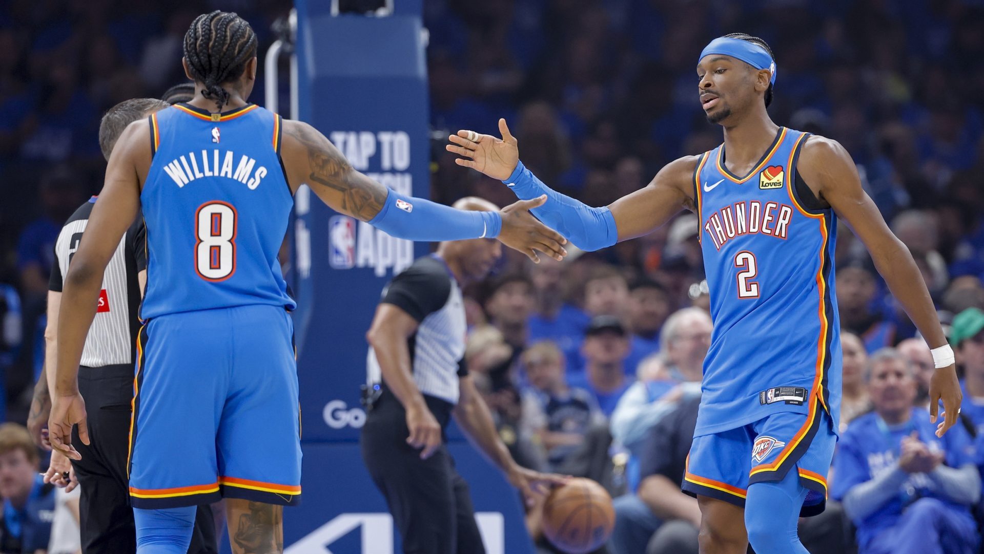 Apr 19, 2026; Oklahoma City, Oklahoma, USA; Oklahoma City Thunder guard Shai Gilgeous-Alexander (2) and Oklahoma City Thunder guard Jalen Williams (8) celebrate after a play against the Phoenix Suns in the first quarter during game one of the first round of the 2026 NBA Playoffs at Paycom Center. Mandatory Credit: Alonzo Adams-Imagn Images