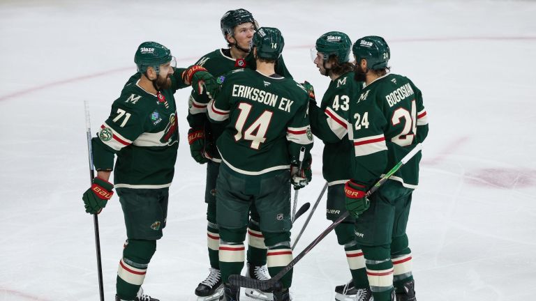 Apr 22, 2026; Saint Paul, Minnesota, USA; Minnesota Wild center Joel Eriksson Ek (14) celebrates his goal with teammates during the second period in game three of the first round of the 2026 Stanley Cup Playoffs against the Dallas Stars at Grand Casino Arena.