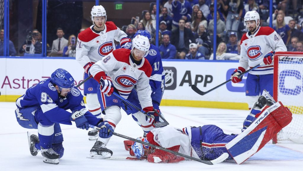 Apr 29, 2026; Tampa, Florida, USA; Montreal Canadiens goaltender Jakub Dobes (75) dives on the puck in front of Tampa Bay Lightning center Gage Goncalves (93) in the third period during game five of the first round of the 2026 Stanley Cup Playoffs at Benchmark International Arena. Mandatory Credit: Nathan Ray Seebeck-Imagn Images