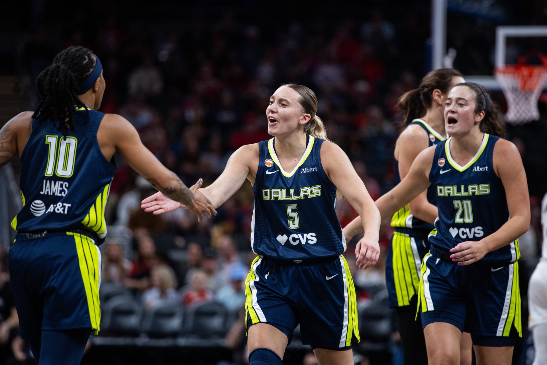 Apr 30, 2026; Indianapolis, IN, USA; Dallas Wings guard Paige Bueckers (5) celebrates during a timeout in the first half against the Indiana Fever at the Gainbridge Fieldhouse.