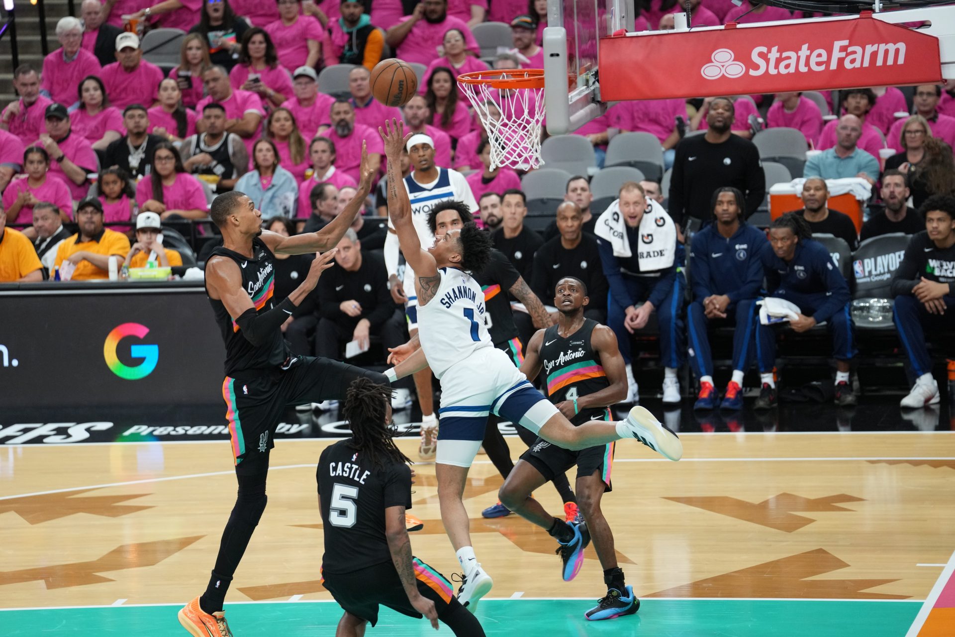 May 4, 2026; San Antonio, Texas, USA; Minnesota Timberwolves guard Terrence Shannon Jr. (1) shoots in front of San Antonio Spurs forward Victor Wembanyama (1) in the second half during game one of the second round of the 2026 NBA Playoffs at Frost Bank Center.