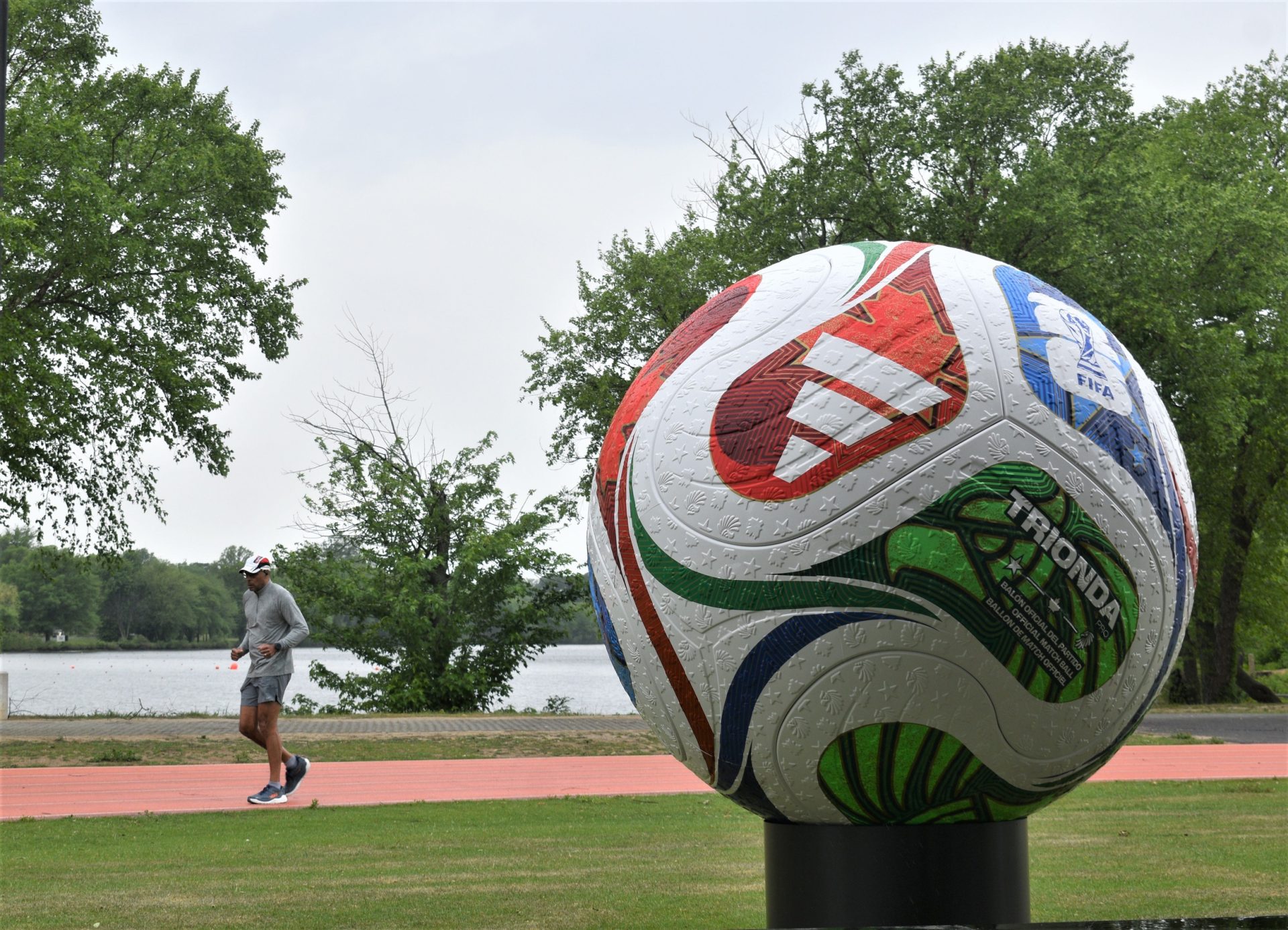 A man jogs around the track at Jack Curtis Stadium in Cooper River Park, Pennsauken, after an appearance by Gov. Mikie Sherrill on May 6, 2026. Sherrill announced a $5 million initiative to bring 2026 World Cup festivities to communities across the state.