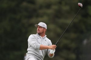 May 15, 2026; Newtown Square, Pennsylvania, USA; Bryson DeChambeau plays his shot on the seventh tee during the second round of the PGA Championship golf tournament.