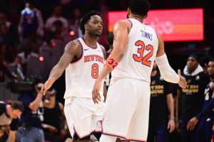 May 25, 2026; Cleveland, Ohio, USA; New York Knicks forward OG Anunoby (8) high fives New York Knicks center Karl-Anthony Towns (32) in the fourth quarter against the Cleveland Cavaliers during game four of the eastern conference finals for the 2026 NBA playoffs at Rocket Arena.