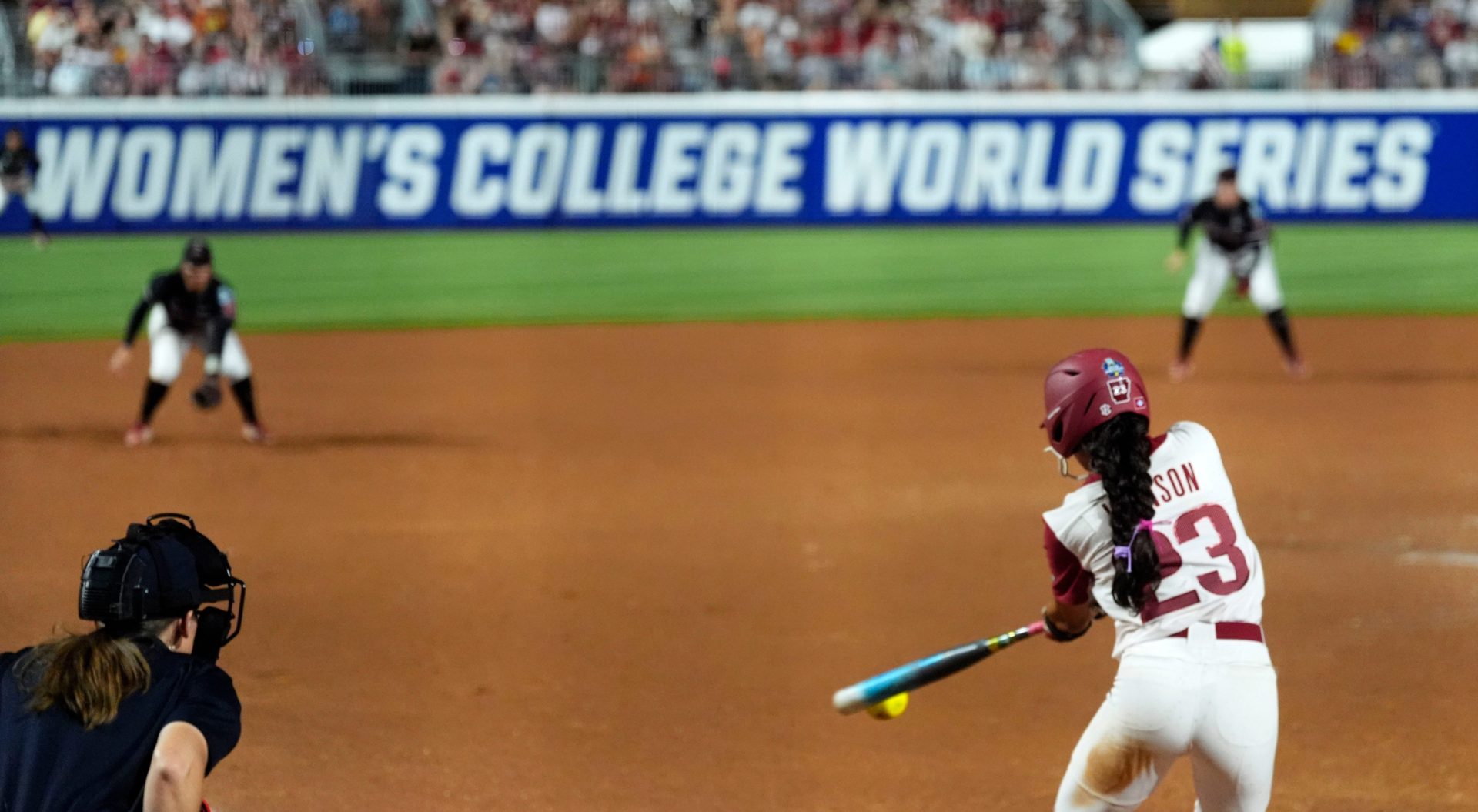 Arkansas' Reagan Johnson (23) hits during a Women's College World Series softball game between the Arkansas Razorbacks and the Nebraska Cornhuskers at Devon Park in Oklahoma City, May 28, 2026.