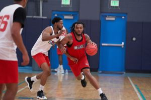 Mar 19, 2022; Scottsdale, AZ, United States; Larry Smith (45) defends while Carlos Johnson (11) drives toward the basket at Victorium. Basketball Big3 Tryouts