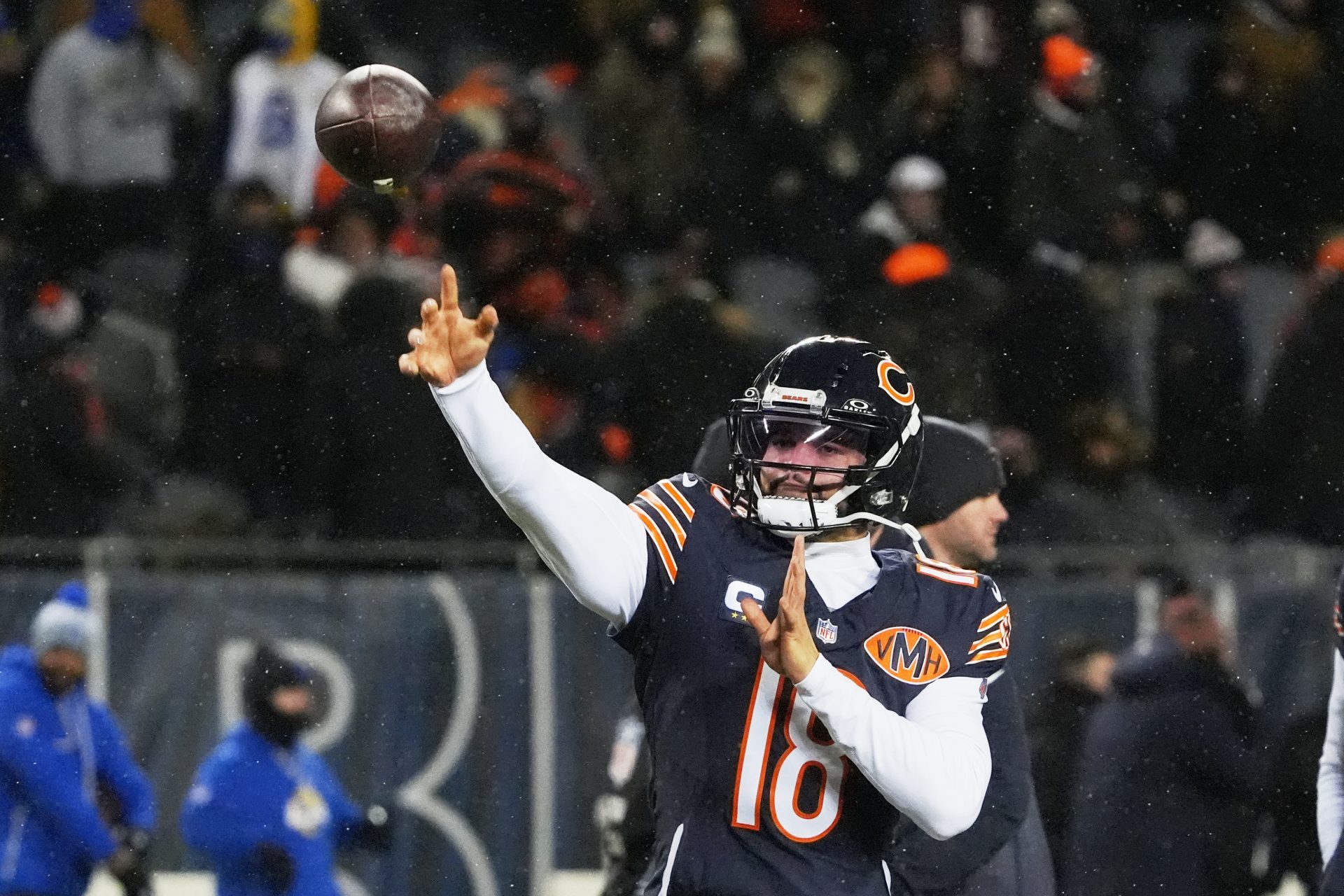 Jan 18, 2026; Chicago, IL, USA; Chicago Bears quarterback Caleb Williams (18) throws a pass during warmups before an NFC Divisional Round game against the Los Angeles Rams at Soldier Field.