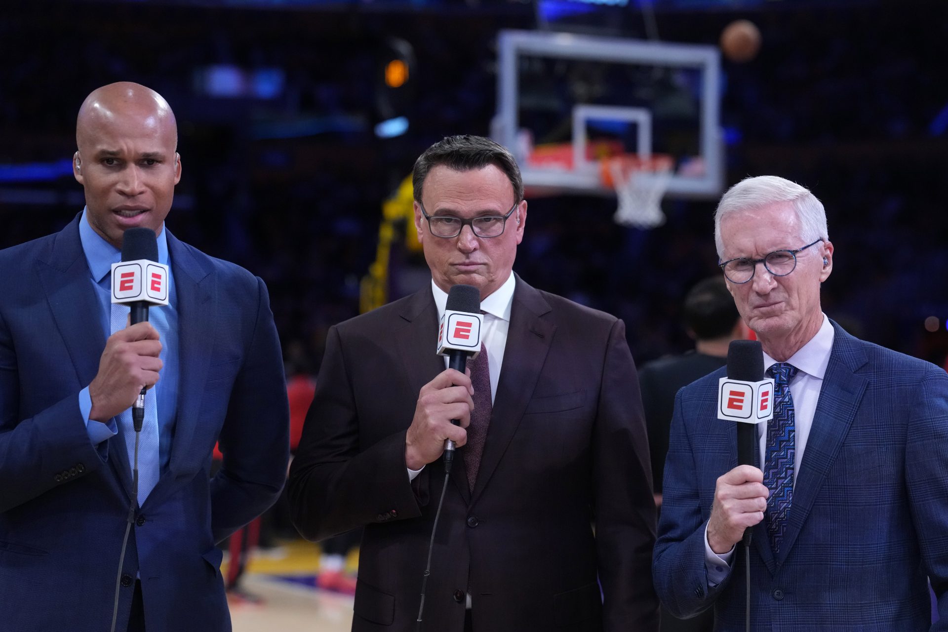 Apr 18, 2026; Los Angeles, California, USA; ESPN analysts Richard Jefferson (left) and Tim Legler (center) and play-by-play announcer Mike Breen during game one of the first round of the 2026 NBA Playoffs between the Los Angeles Lakers and the Houston Rockets at Crypto.com Arena.