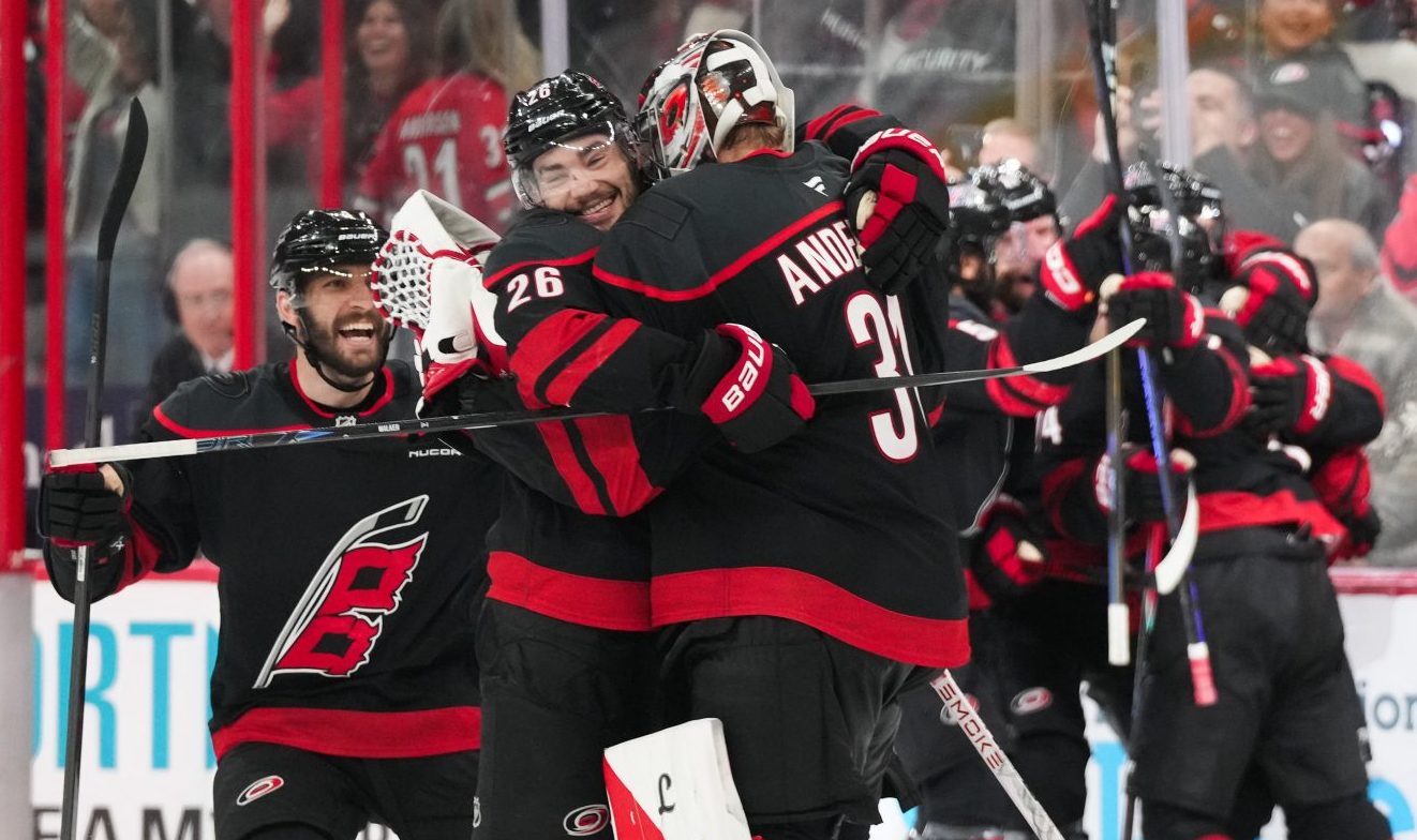 May 23, 2026; Raleigh, North Carolina, USA; The Carolina Hurricanes celebrate after an overtime goal against the Montréal Canadiens in game two of the Eastern Conference Final of the 2026 Stanley Cup Playoffs at Lenovo Center.