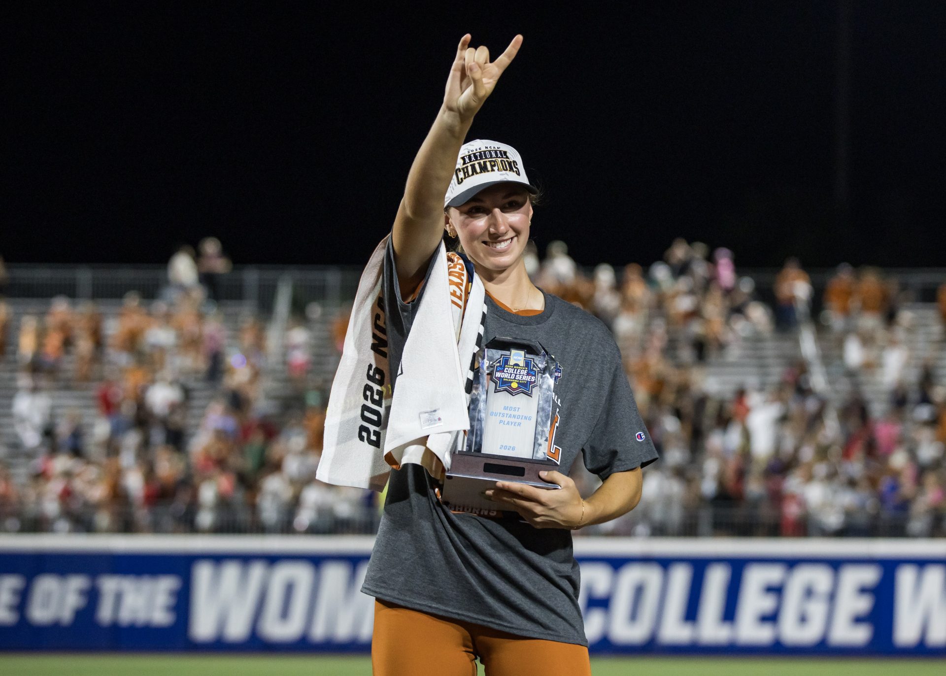 Jun 4, 2026; Oklahoma City, OK, USA; Texas Longhorns pitcher Teagan Kavan (17) reacts after receiving the most outstanding player trophy for the NCAA WomenÕs College World Series championship series at Devon Park.