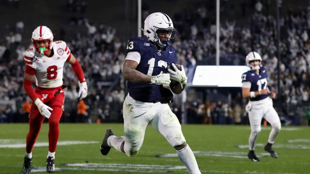 Nov 22, 2025; University Park, Pennsylvania, USA; Penn State Nittany Lions running back Kaytron Allen (13) runs the ball into the end zone for a touchdown during the fourth quarter against the Nebraska Cornhuskers at Beaver Stadium.