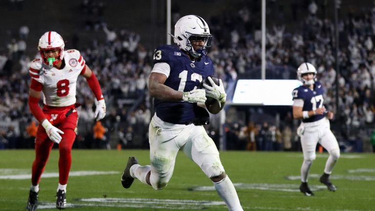 Nov 22, 2025; University Park, Pennsylvania, USA; Penn State Nittany Lions running back Kaytron Allen (13) runs the ball into the end zone for a touchdown during the fourth quarter against the Nebraska Cornhuskers at Beaver Stadium.