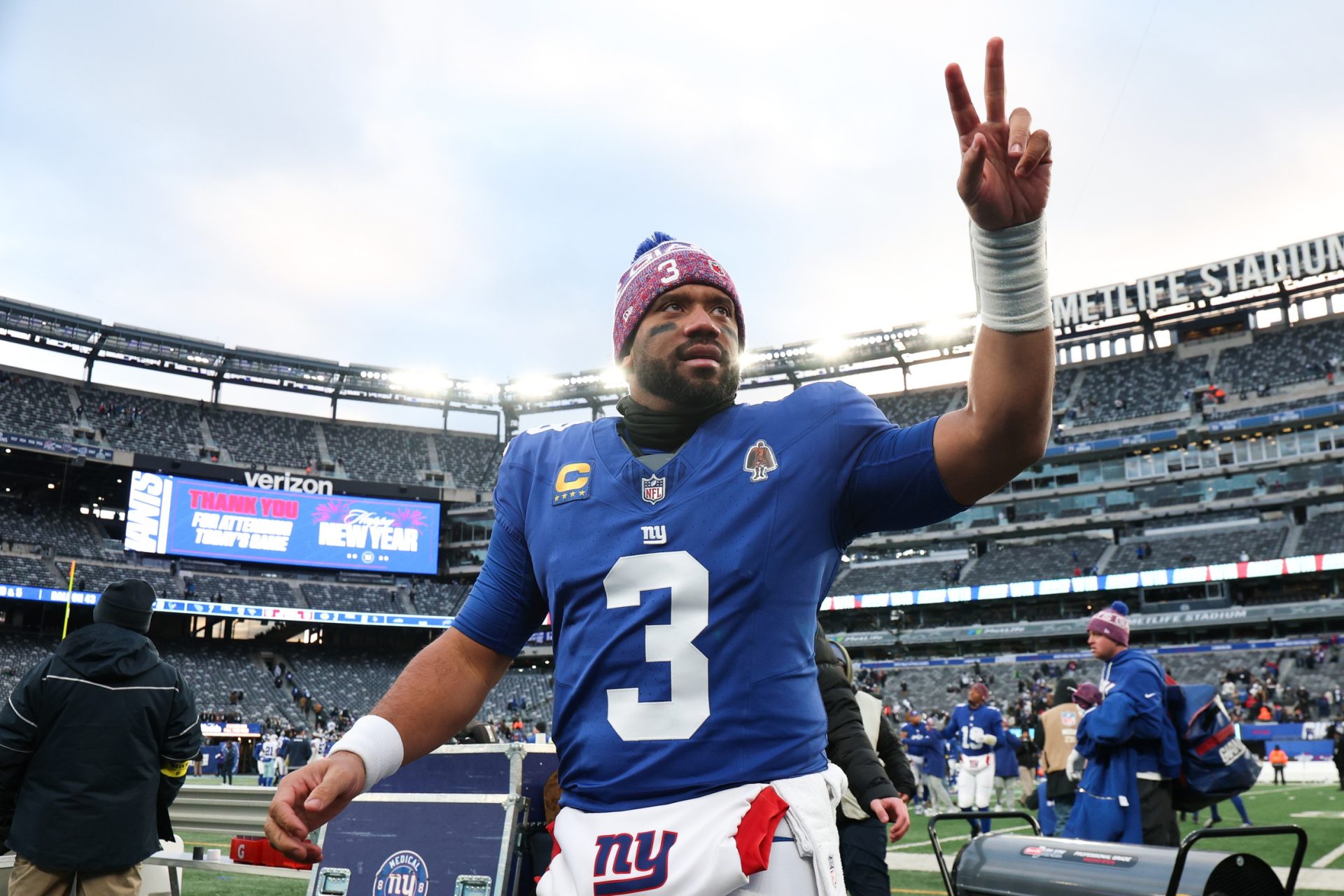 Jan 4, 2026; East Rutherford, New Jersey, USA; New York Giants quarterback Russell Wilson (3) waves to fans after the game against the Dallas Cowboys at MetLife Stadium.