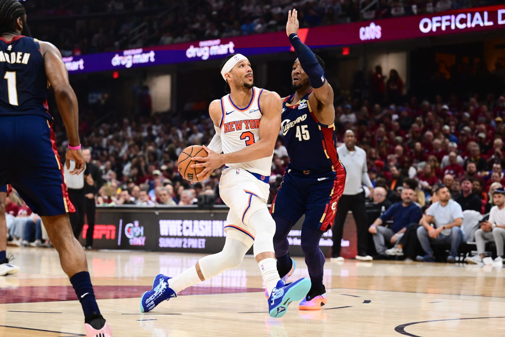 May 25, 2026; Cleveland, Ohio, USA; New York Knicks forward Josh Hart (3) drives the ball while defended by Cleveland Cavaliers guard Donovan Mitchell (45) in the second quarter during game four of the eastern conference finals for the 2026 NBA playoffs at Rocket Arena.