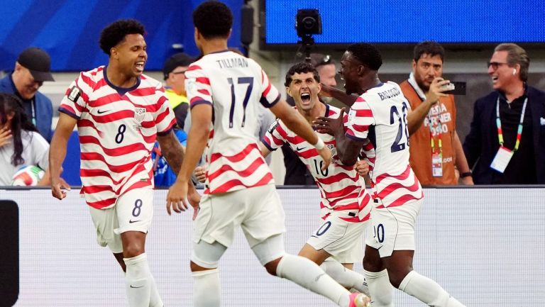 June 12, 2026; Inglewood, California, U.S.; Christian Pulisic, Weston McKennie, Folarin Balogun and Malik Tillman of the U.S. celebrate their first goal, an own goal scored by Paraguay's Damian Bobadilla. Mandatory Credit: Kirby Lee-Imagn Images