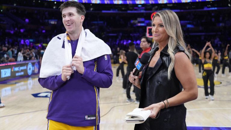 Oct 24, 2025; Los Angeles, California, USA; NBA on Prime reporter Allie Clifton (right) interviews Los Angeles Lakers guard Austin Reaves (15) after the game against the Minnesota Timberwolves at Crypto.com Arena. Mandatory Credit: Kirby Lee-Imagn Images
