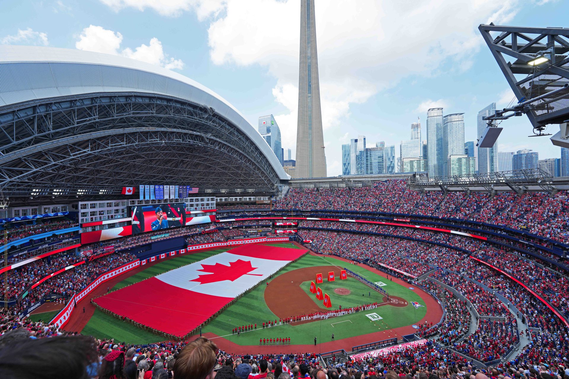 Jul 1, 2026; Toronto, Ontario, CAN; A general view of the opening ceremonies and Canadian National anthem before the start of a game between the New York Mets and theT oronto Blue Jays at Rogers Centre.