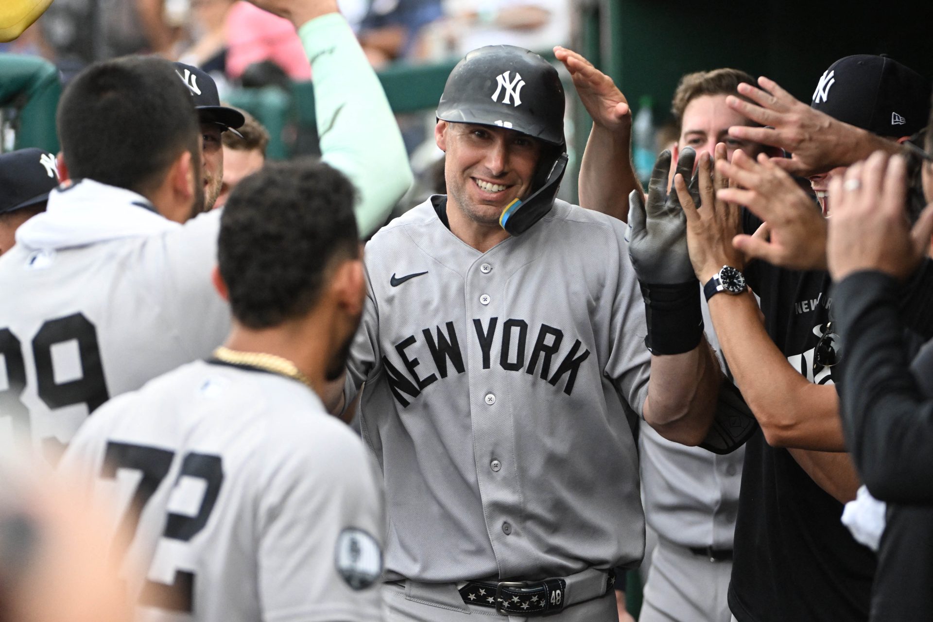 Jul 10, 2026; Washington, District of Columbia, USA; New York Yankees first baseman Paul Goldschmidt (48) is congratulated by teammates after hitting a solo home run against the Washington Nationals during the eighth inning at Nationals Park.