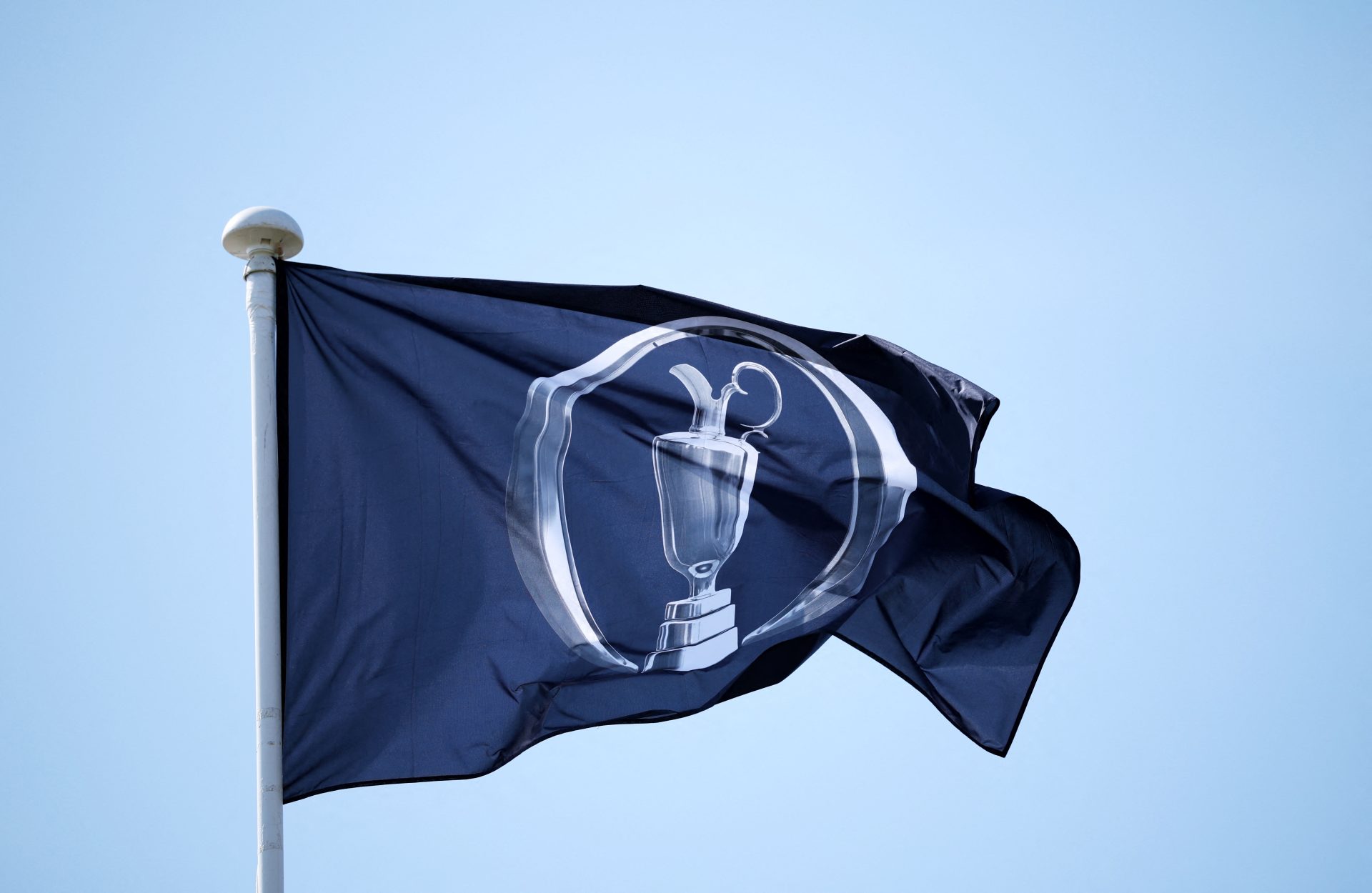 Golf - The 154th Open Championship - Royal Birkdale Golf Club, Southport, Britain - July 13, 2026 General view of a flag with the Claret Jug trophy during practice