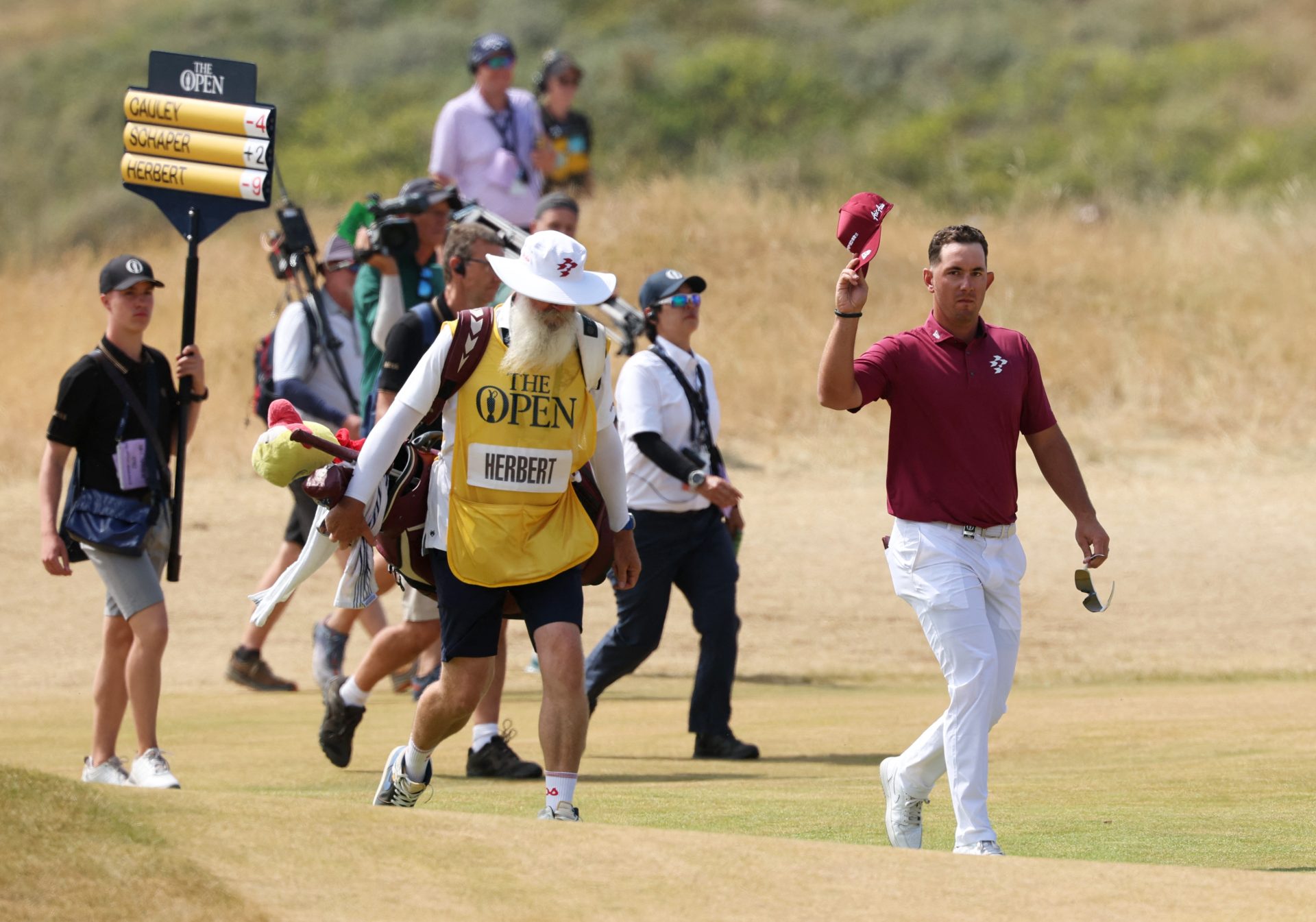 Golf - The 154th Open Championship - Royal Birkdale Golf Club, Southport, Britain - July 17, 2026 Australia's Lucas Herbert acknowledges spectators after making his putt for bogey on the 18th hole during the second round