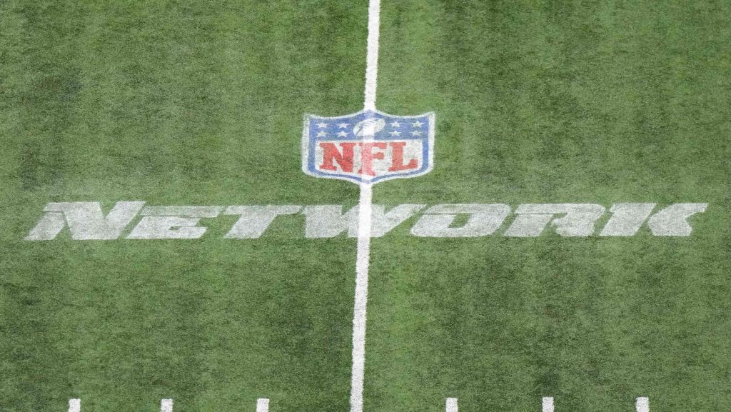 Mar 4, 2023; Indianapolis, IN, USA; The NFL Network logo on the field at Lucas Oil Stadium. Mandatory Credit: Kirby Lee-USA TODAY Sports